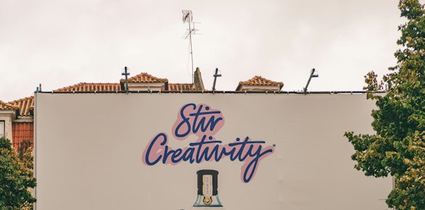 The message on the top half of a billboard reads 'sitr creativity' The message on the top half of a billboard reads 'sitr creativity'