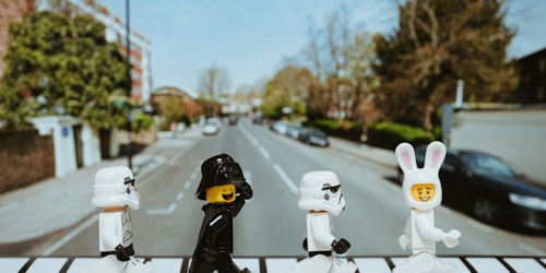 Four lego people on a pedestrian crossing Four lego people on a pedestrian crossing