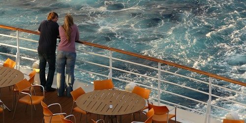 People on a cruise deck People on a cruise deck