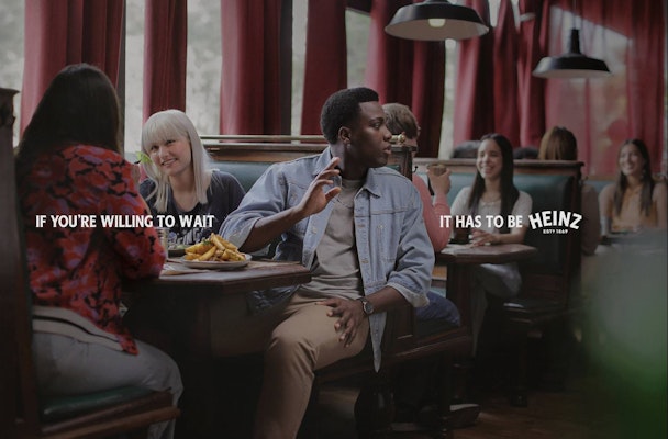 A diner waits patiently for a bottle of Heinz A diner waits patiently for a bottle of Heinz