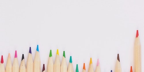 A row of pencils, all of different colors A row of pencils, all of different colors