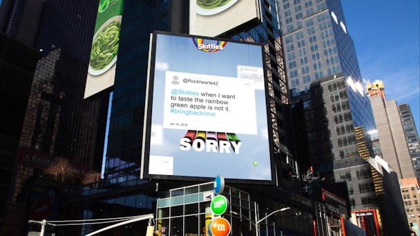 A Times Square billboard with a Skitttles ad apologizing to angry fans A Times Square billboard with a Skitttles ad apologizing to angry fans