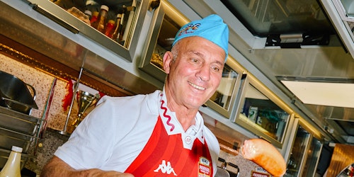 Man wearing Heinz apron Man wearing Heinz apron