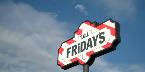 TGI Friday's sign against a blue sky TGI Friday's sign against a blue sky