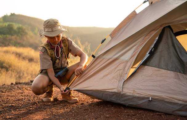 boy scout pitching a tent boy scout pitching a tent