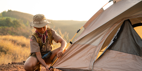 boy scout pitching a tent boy scout pitching a tent