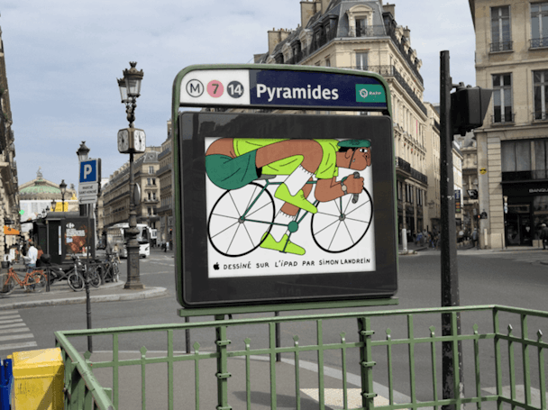 Illustration of a cyclist, created on an iPad, on an ad hoarding at the entrance of a Paris Metro station Illustration of a cyclist, created on an iPad, on an ad hoarding at the entrance of a Paris Metro station