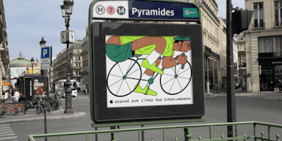 Illustration of a cyclist, created on an iPad, on an ad hoarding at the entrance of a Paris Metro station