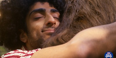 man hugging a bear