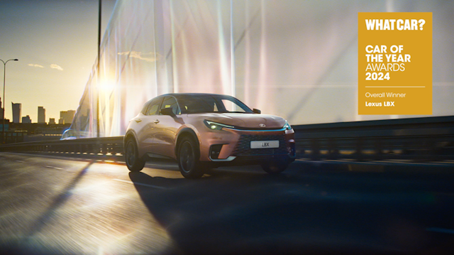 Lexus car driving over a bridge Lexus car driving over a bridge